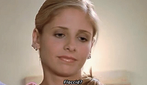 Close Up Of Woman With Word Flaccid GIF
