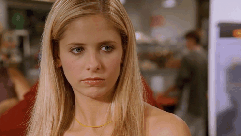 Close Up Of Woman With Yellow Necklace GIF