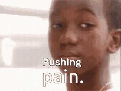 Close Up Of Young Boy Pushing Pain GIF