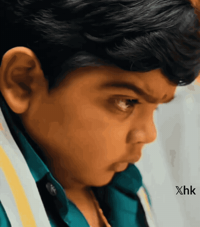 Close Up Of Young Boy With XHK GIF