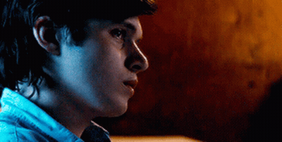 Close Up Of Young Man In Blue Shirt GIF