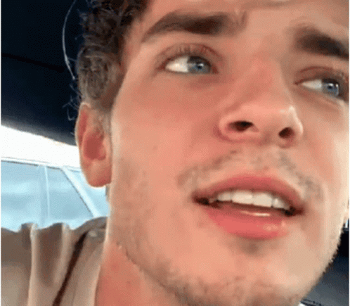 Close Up Of Young Man's Bearded Face GIF