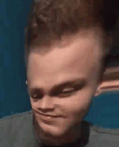 Close Up Of Young Man's Face With Large Head GIF