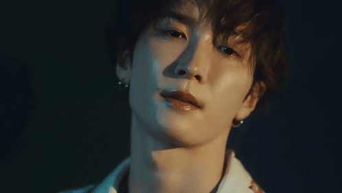 Close Up Of Young Man's Face With Shadow GIF