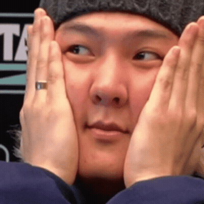 Close Up Person Covering Face With Hands GIF