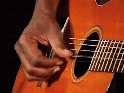 Close Up Person Playing Guitar With Fingers GIF