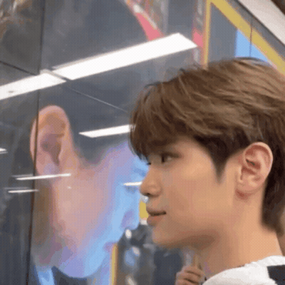 Close Up Person's Face Another's Reflection Mirror GIF