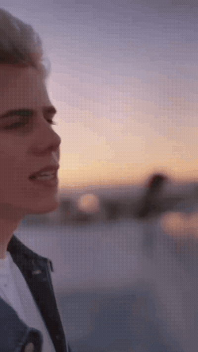 Close Up Person's Face With Sunset GIF