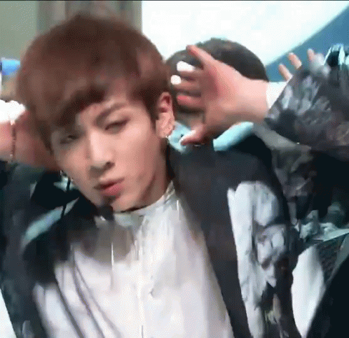 Close Up Person Touching Another's Head GIF