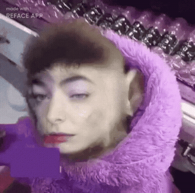 Close Up Person Wearing Purple Wig GIF