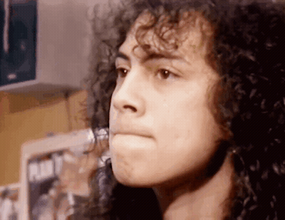 Close Up Person With Curly Hair Looking GIF