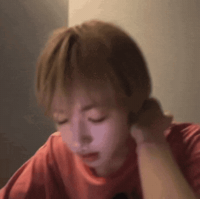 Close Up Person With Eyes Closed And Red Shirt GIF
