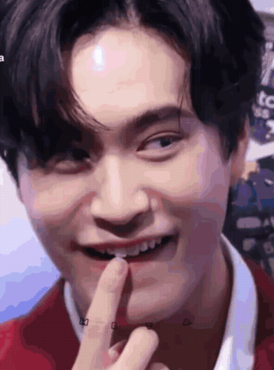 Close-Up Person With Finger In Mouth GIF