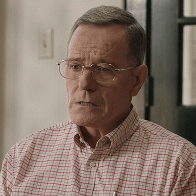 Close Up Person With Glasses And Viggle.ai Logo GIF