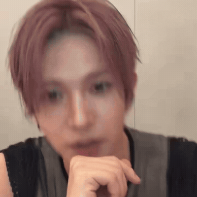 Close Up Person With Hand On Chin GIF