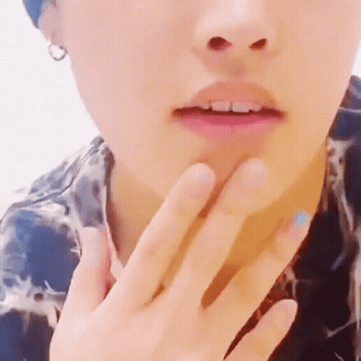 Close Up Person With Hand On Neck GIF