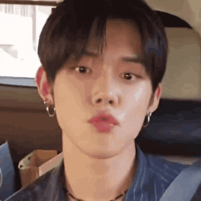 Close Up Person With Mouth Open And Earrings GIF