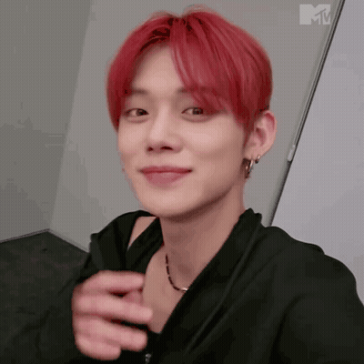 Close-Up Person With Red Hair And Black Jacket GIF