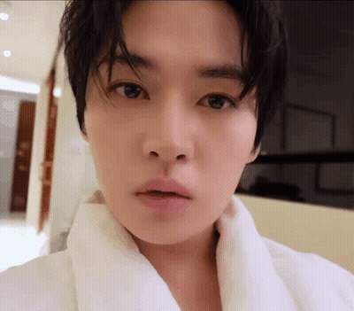Close Up Person With White Towel Around Neck GIF