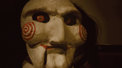 Close Up Puppet With Swirl On Face GIF