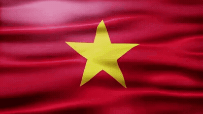 Close Up Red Flag With Yellow Star GIF