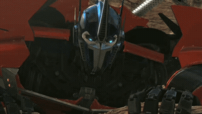 Close Up Robot Face With Blue Eyes GIF