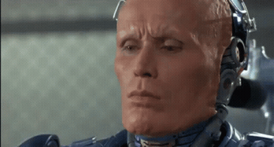 Close Up Robot Face With Eyes Closed GIF