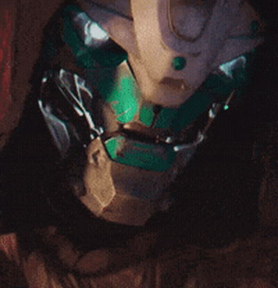Close Up Robot Face With Green Eye GIF