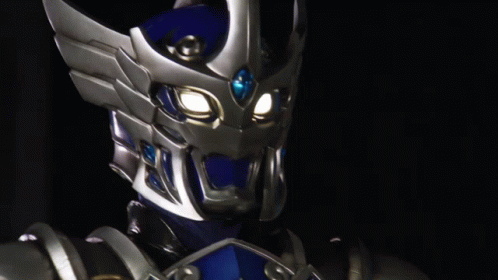 Close Up Robot Face With Lit Eyes GIF