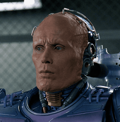 Close Up Robot Head With Helmet GIF