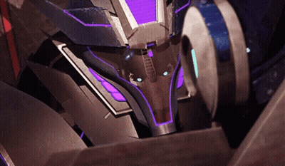 Close Up Robot Head With Purple And Blue Lights GIF