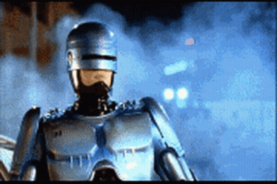Close Up Robot With Helmet And Goggles GIF