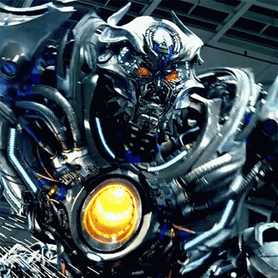 Close Up Robot With Red Eyes And Yellow Light GIF