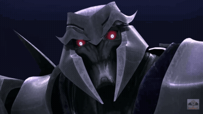 Close Up Robot With Red Eyes Transformers GIF