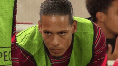 Close Up Soccer Player In Green Vest GIF