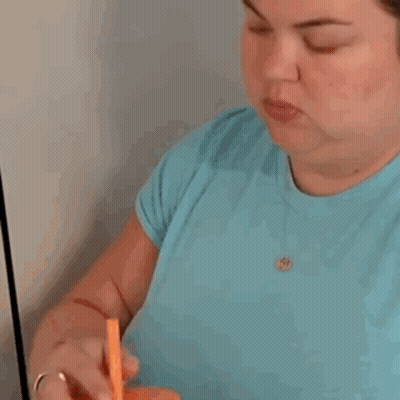 Close Up Woman Blue Shirt Earrings GIF