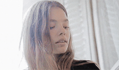Close-Up Woman Eyes Closed Hair Blowing GIF