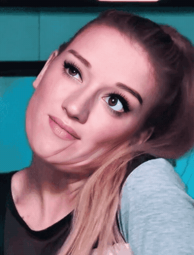 Close Up Woman Face Blue Background GIF