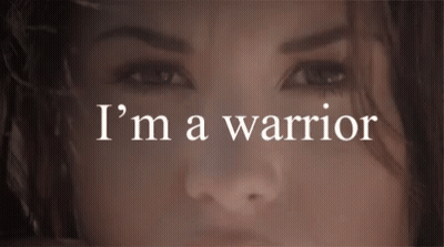 Close Up Woman Face Saying I'm A Warrior GIF