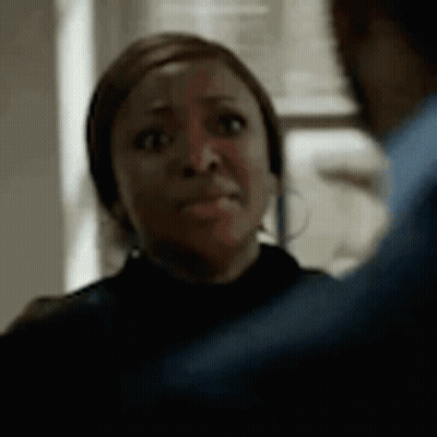 Close Up Woman Face With Arm Behind Her GIF