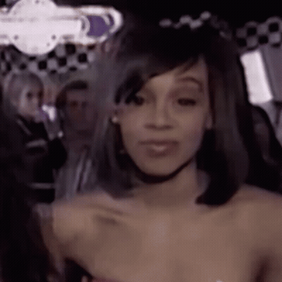 Close-Up Woman Face With Crowd Background GIF