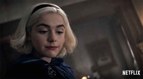Close Up Woman Face With Netflix Logo GIF