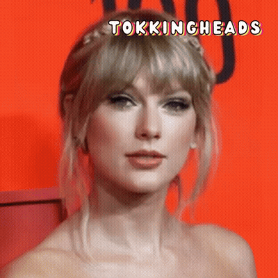 Close Up Woman Face With Tokingheads Above GIF