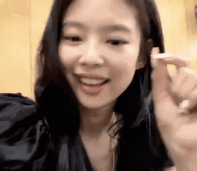 Close Up Woman Holding Something GIF