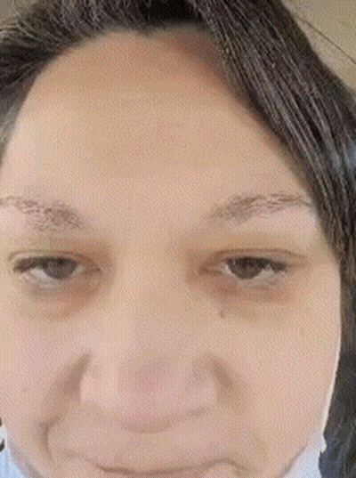 Close-Up Woman In Mask GIF