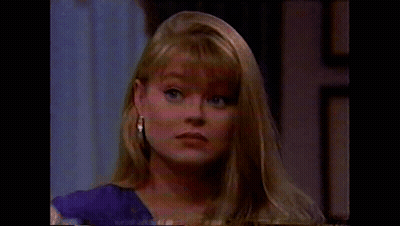 Close Up Woman In Purple Shirt GIF