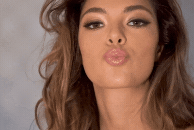 Close Up Woman Making Funny Face GIF