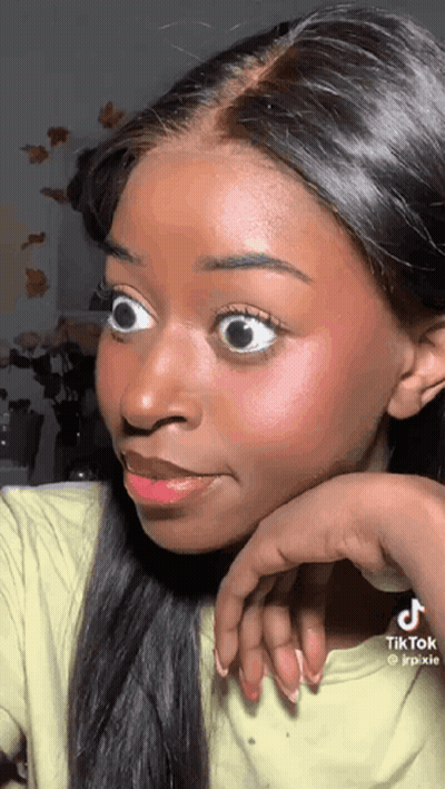 Close Up Woman Making Funny Face Hand On Face GIF