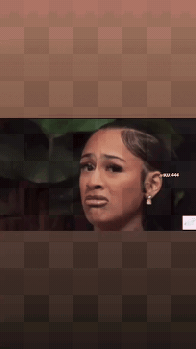 Close Up Woman Making Funny Face With Earrings GIF
