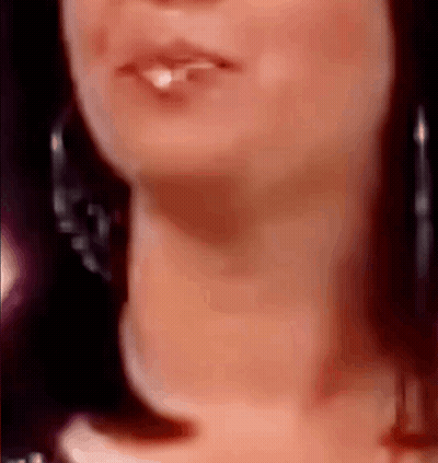Close Up Woman Mouth And Neck With Earrings GIF